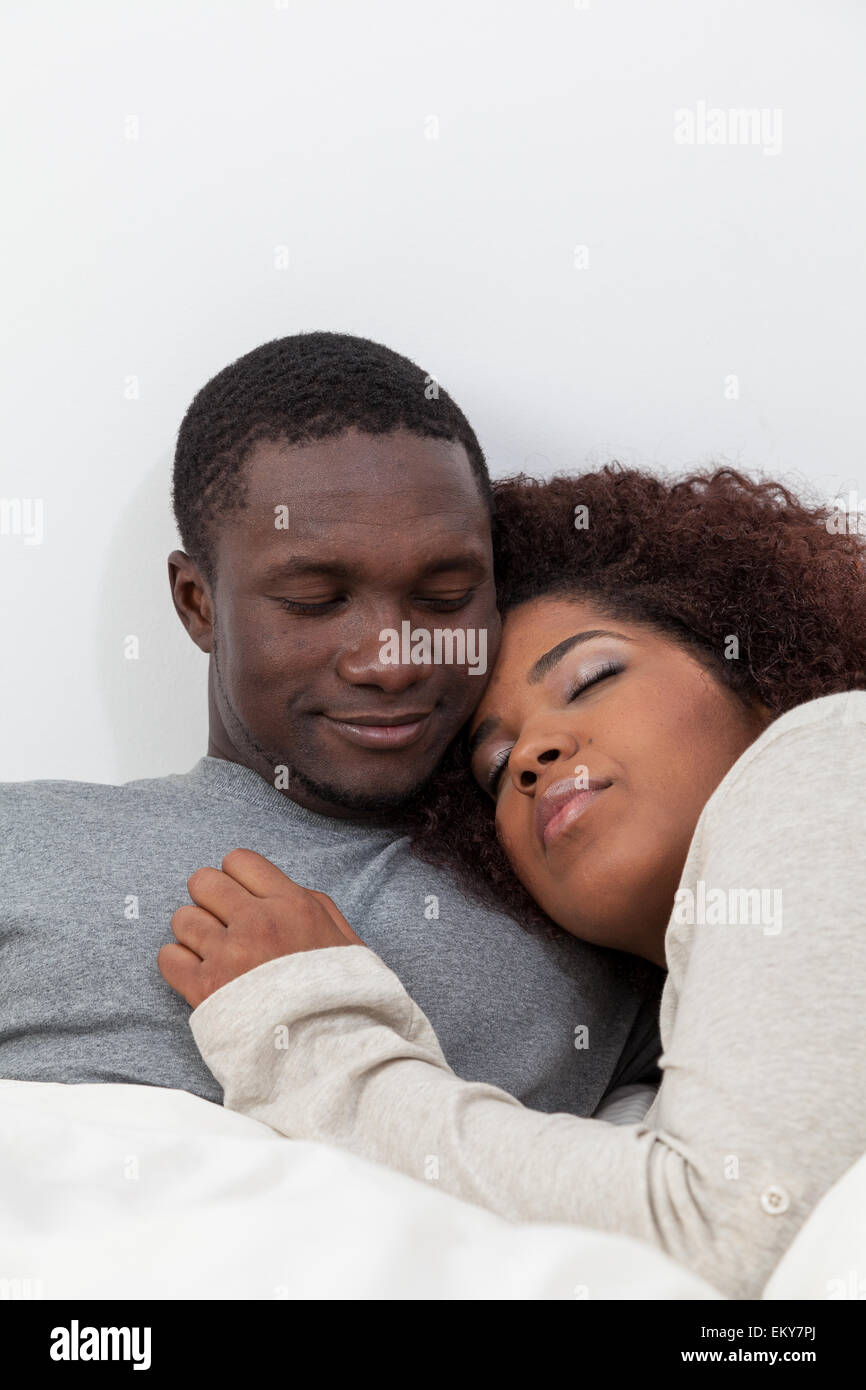 African couple in love on the bed Stock Photo - Alamy