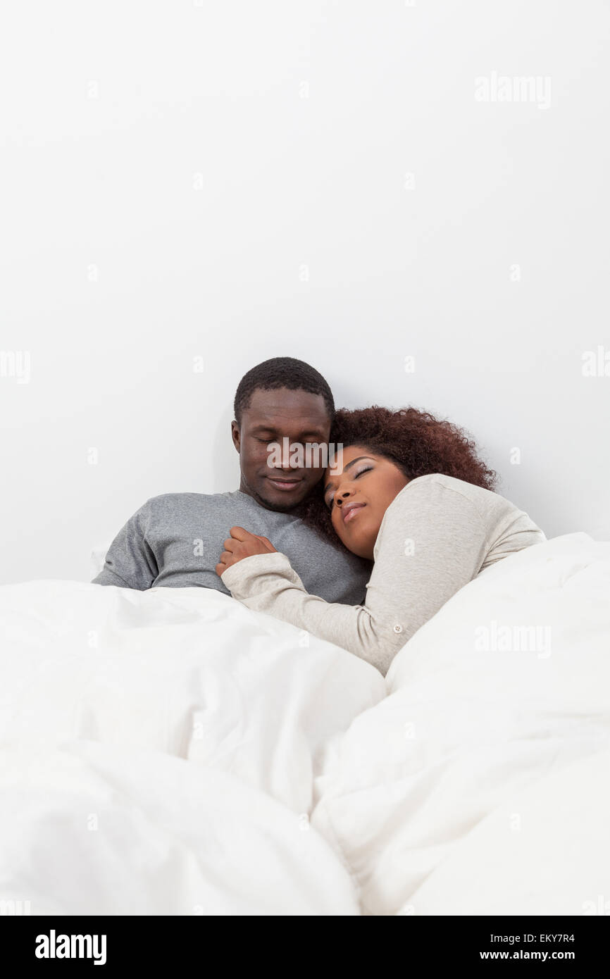 African couple in love on the bed Stock Photo - Alamy