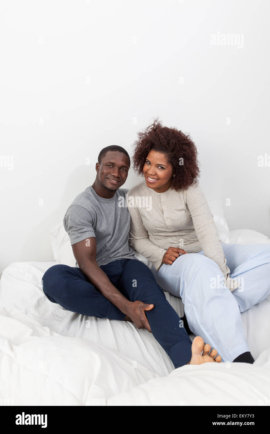 African couple in love on the bed Stock Photo - Alamy
