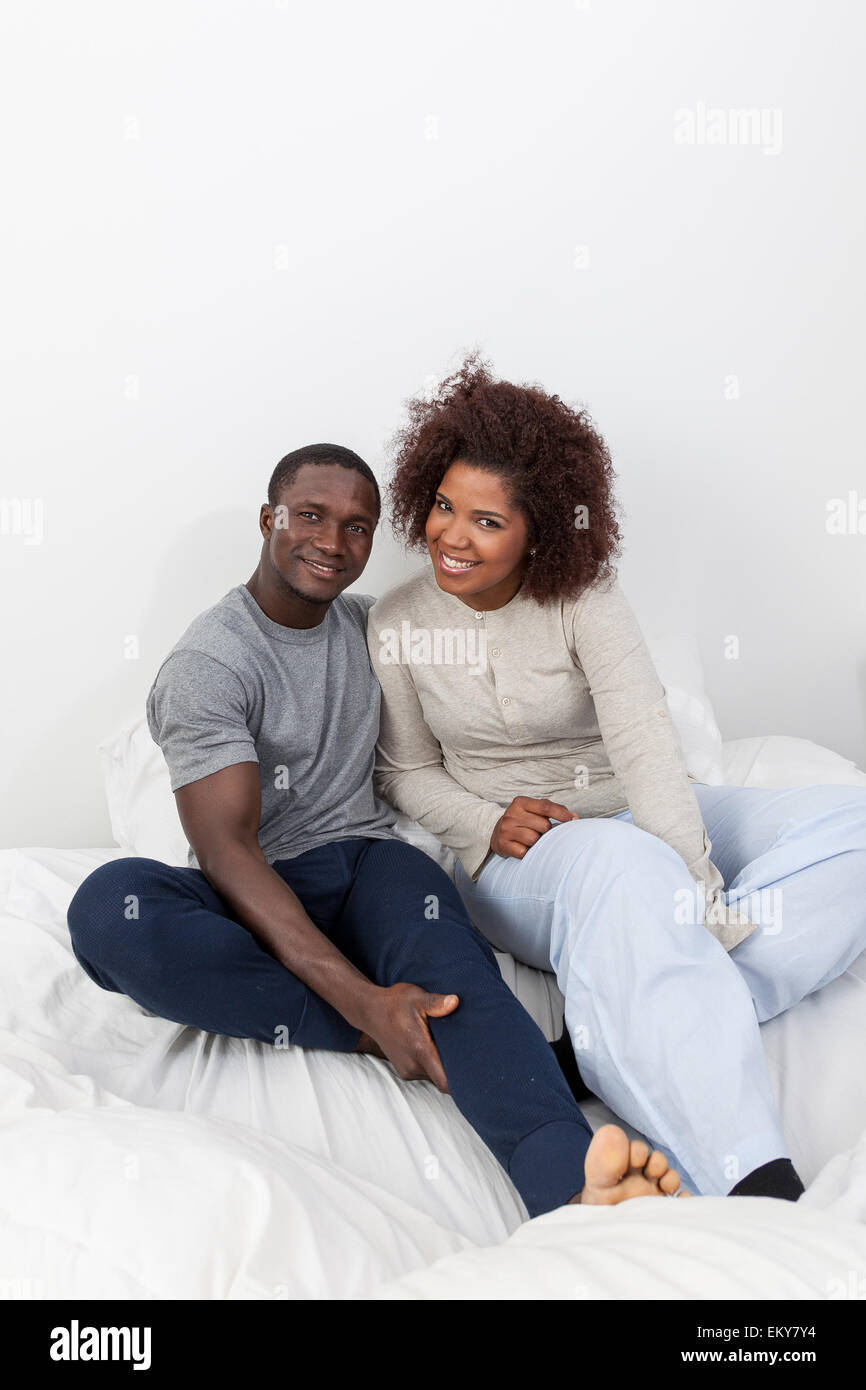 African couple in love on the bed Stock Photo - Alamy