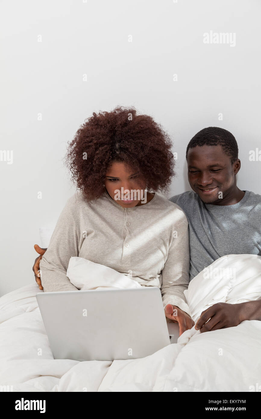 African couple in love on the bed Stock Photo - Alamy