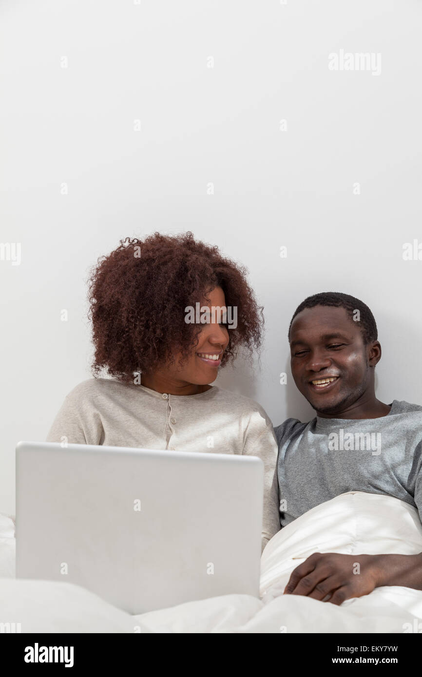 African couple in love on the bed Stock Photo - Alamy