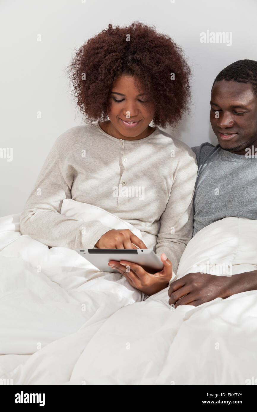 African couple in love on the bed Stock Photo - Alamy