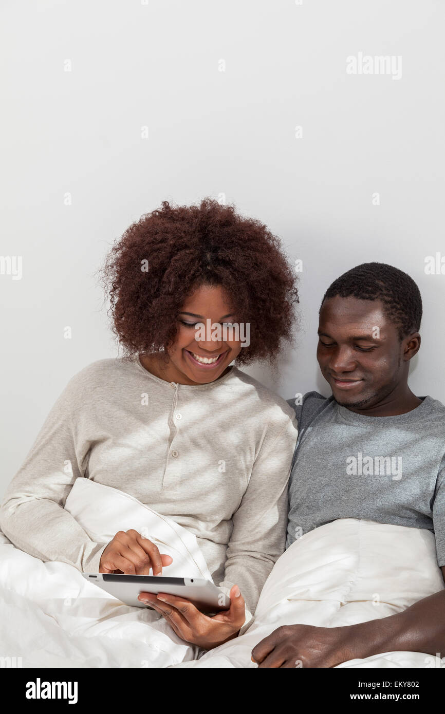 African couple in love on the bed Stock Photo - Alamy