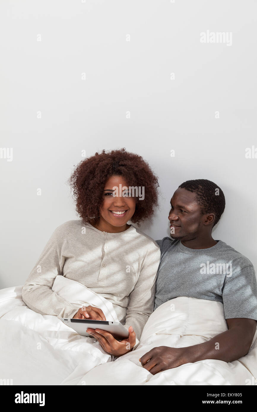 African couple in love on the bed Stock Photo - Alamy