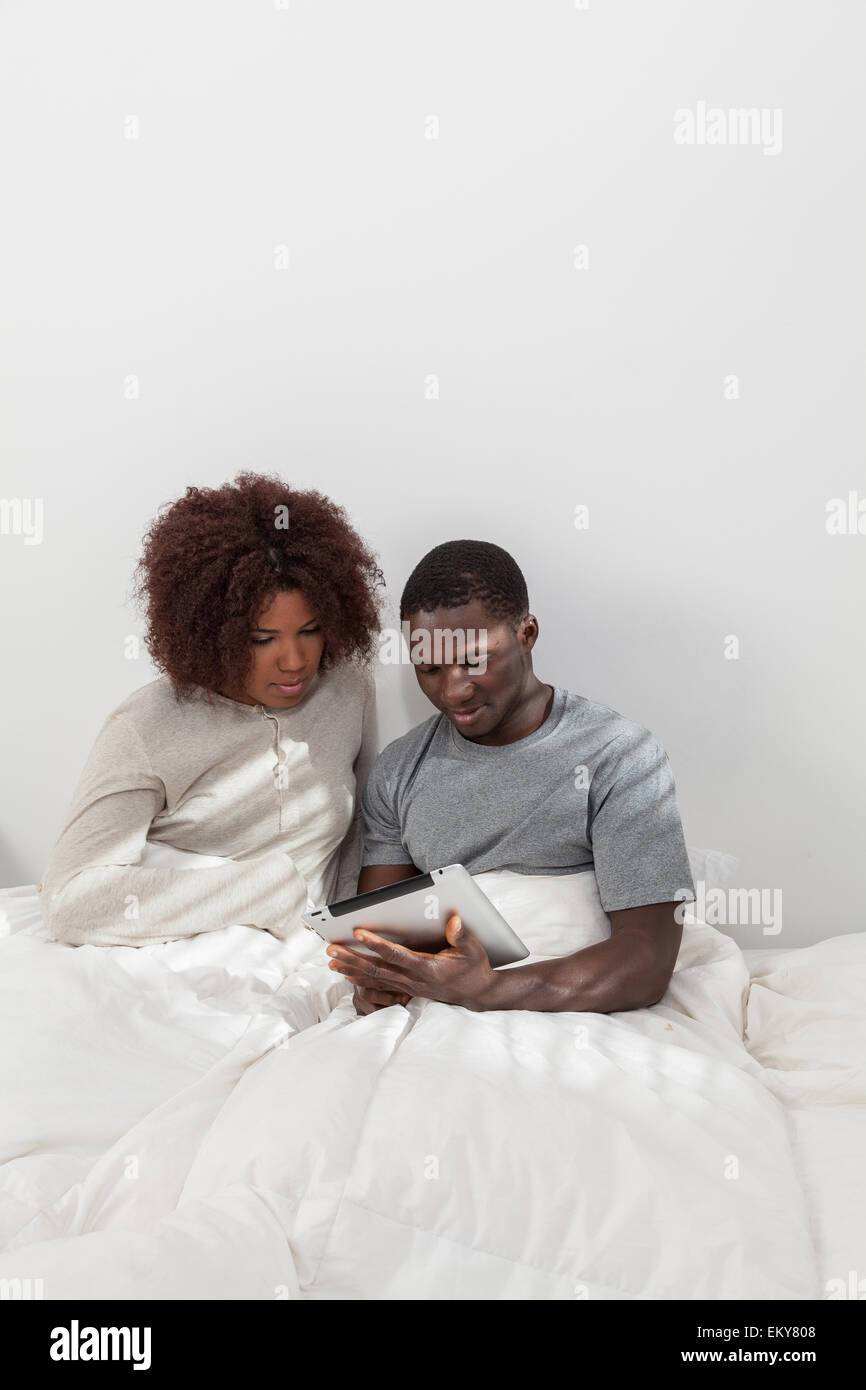African couple in love on the bed Stock Photo - Alamy