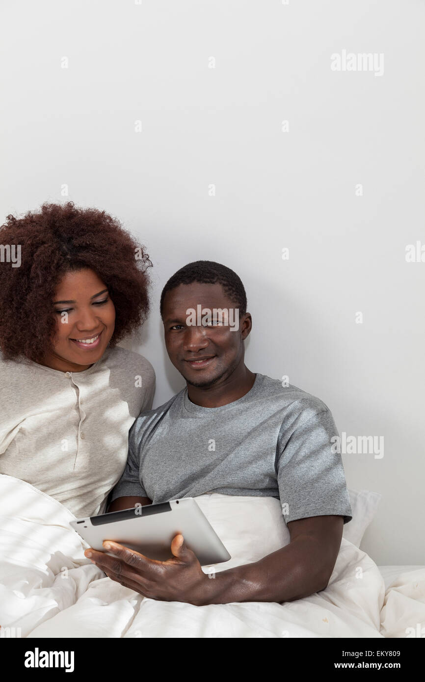 African couple in love on the bed Stock Photo - Alamy