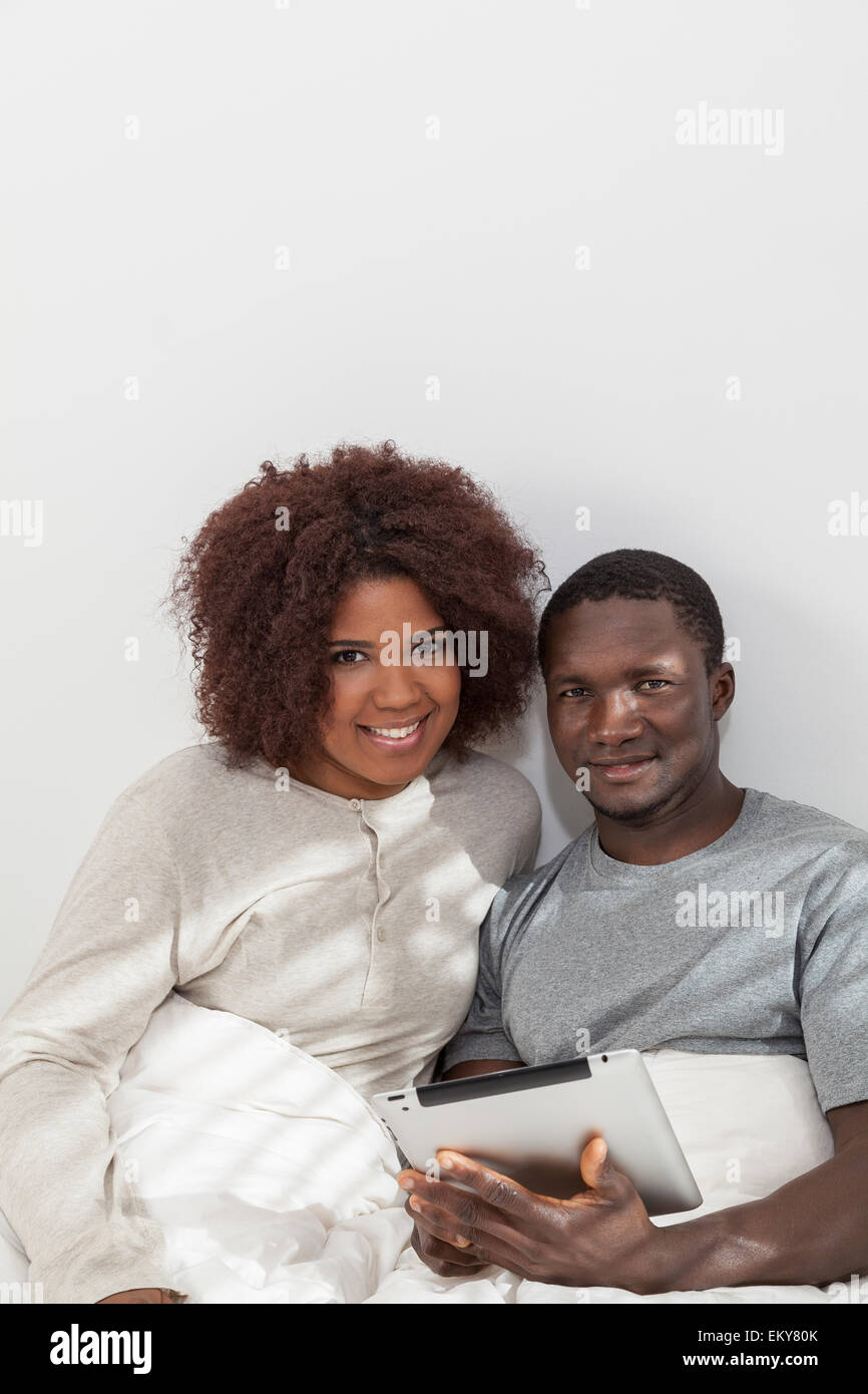 African couple in love on the bed Stock Photo - Alamy