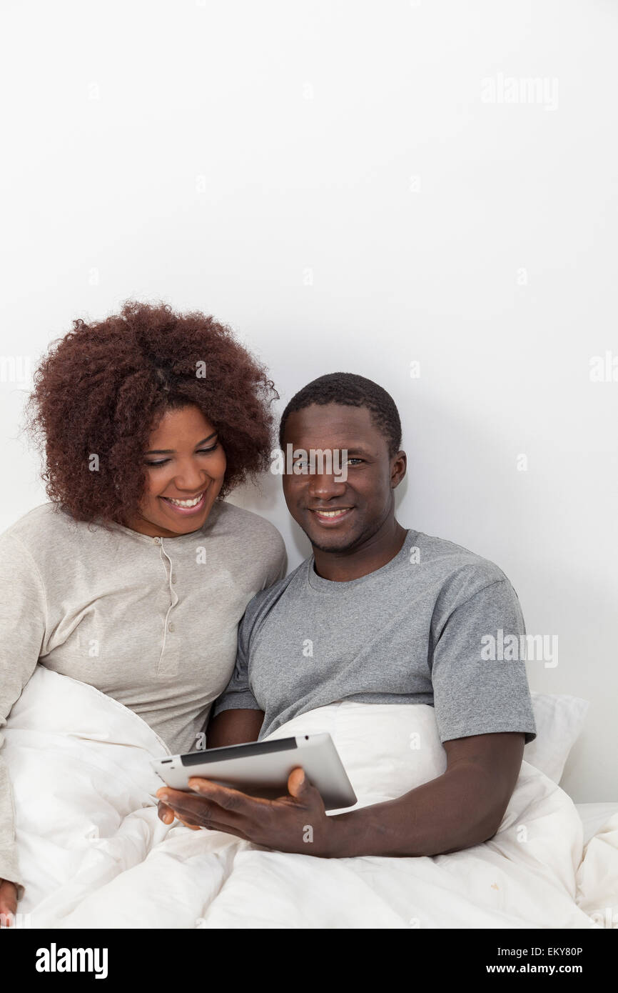 African couple in love on the bed Stock Photo - Alamy