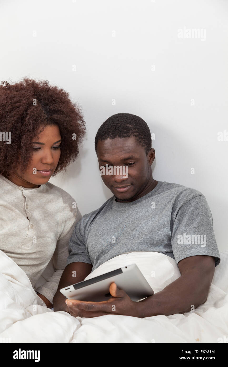 African couple in love on the bed Stock Photo - Alamy