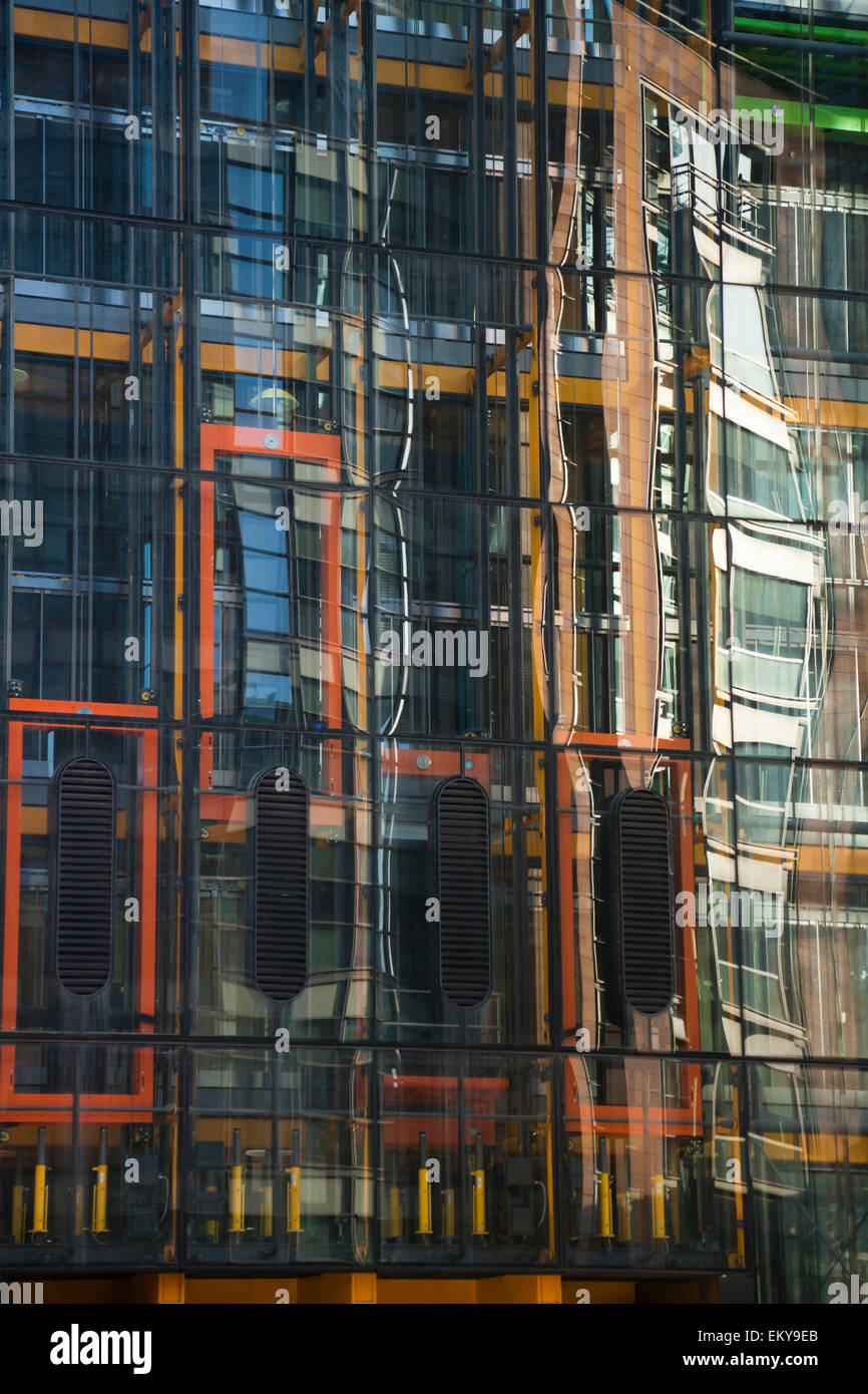 Reflections in City of London building. 122 Leadenhall Street, informally known as 'The Cheesegrater' Stock Photo
