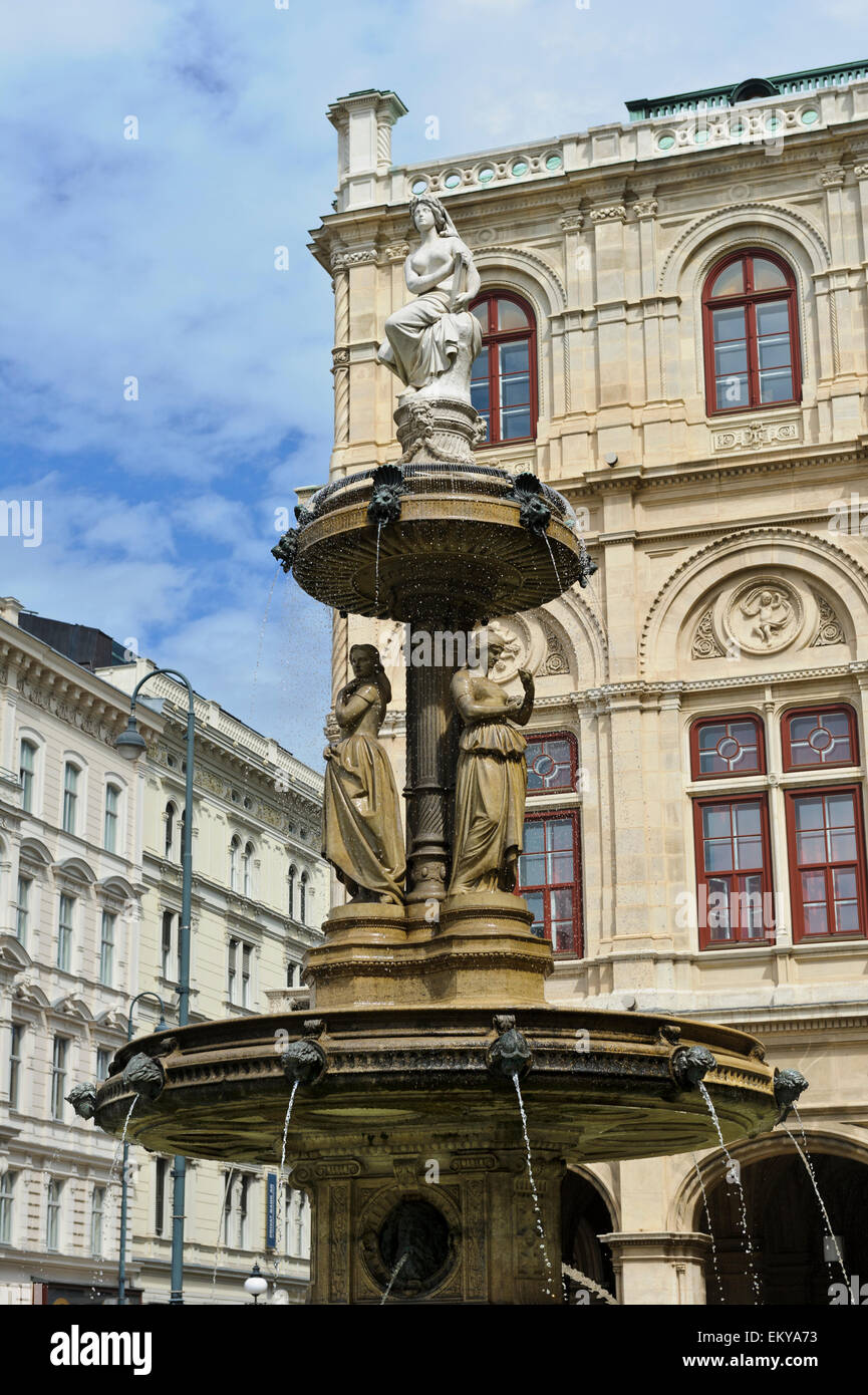 A water fountain with sculptures outside the State Opera Theater, Vienna, Austria. Stock Photo