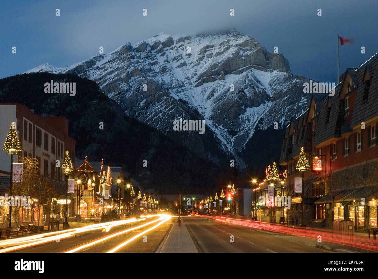 Banff Avenue Illuminated At Night; Banff, Alberta, Canada Stock Photo