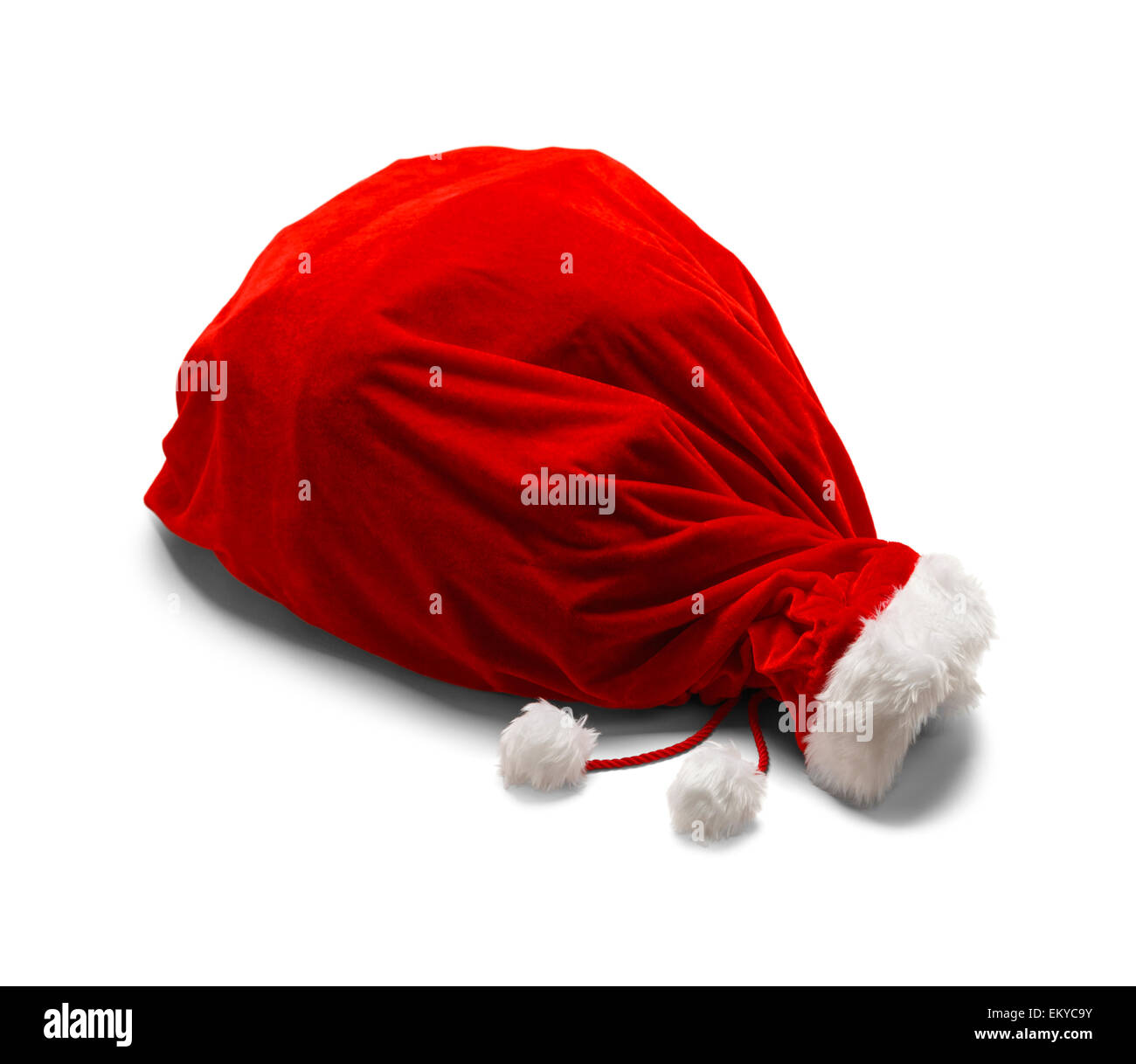 Red Velvet Santa Bag on Side Isolated on White Background. Stock Photo