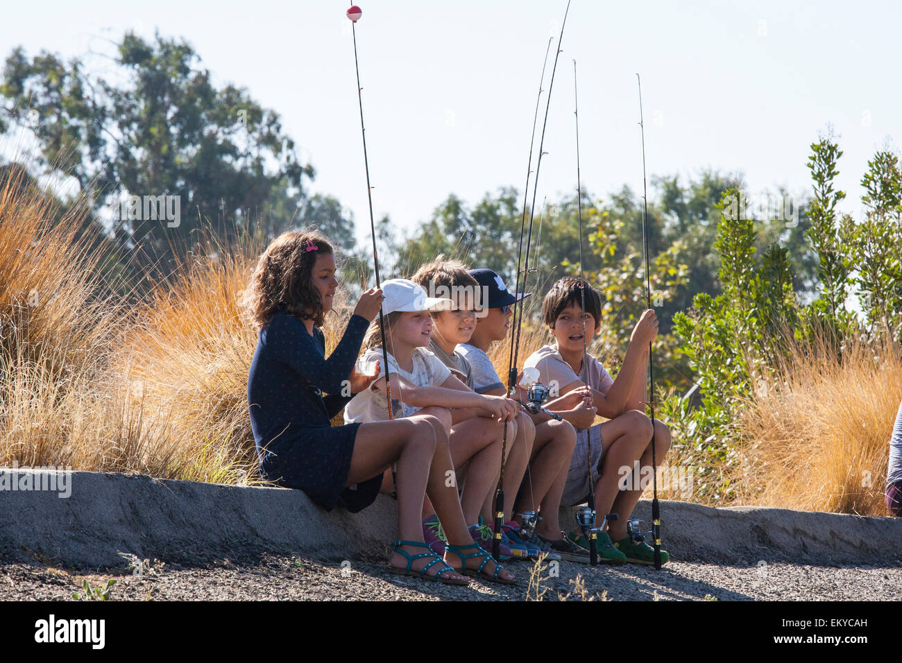 Kids and those wishing to learn to fish attend The first annual Off tha’ Hook fly fishing event, Los Angeles River Stock Photo