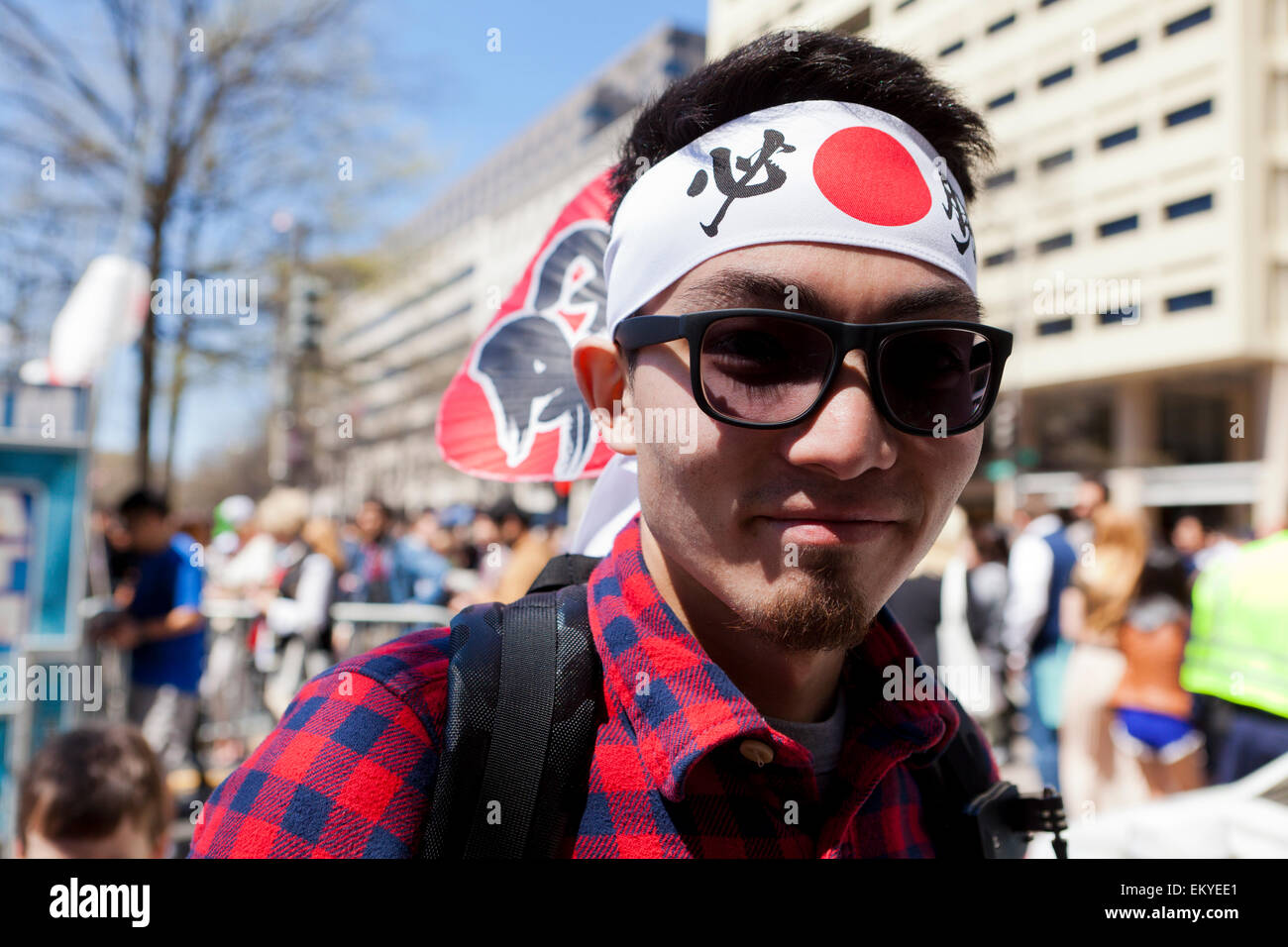 Young Japanese man at Sakura Matsuri (Cherry Blossom Festival) - Washington, DC USA Stock Photo