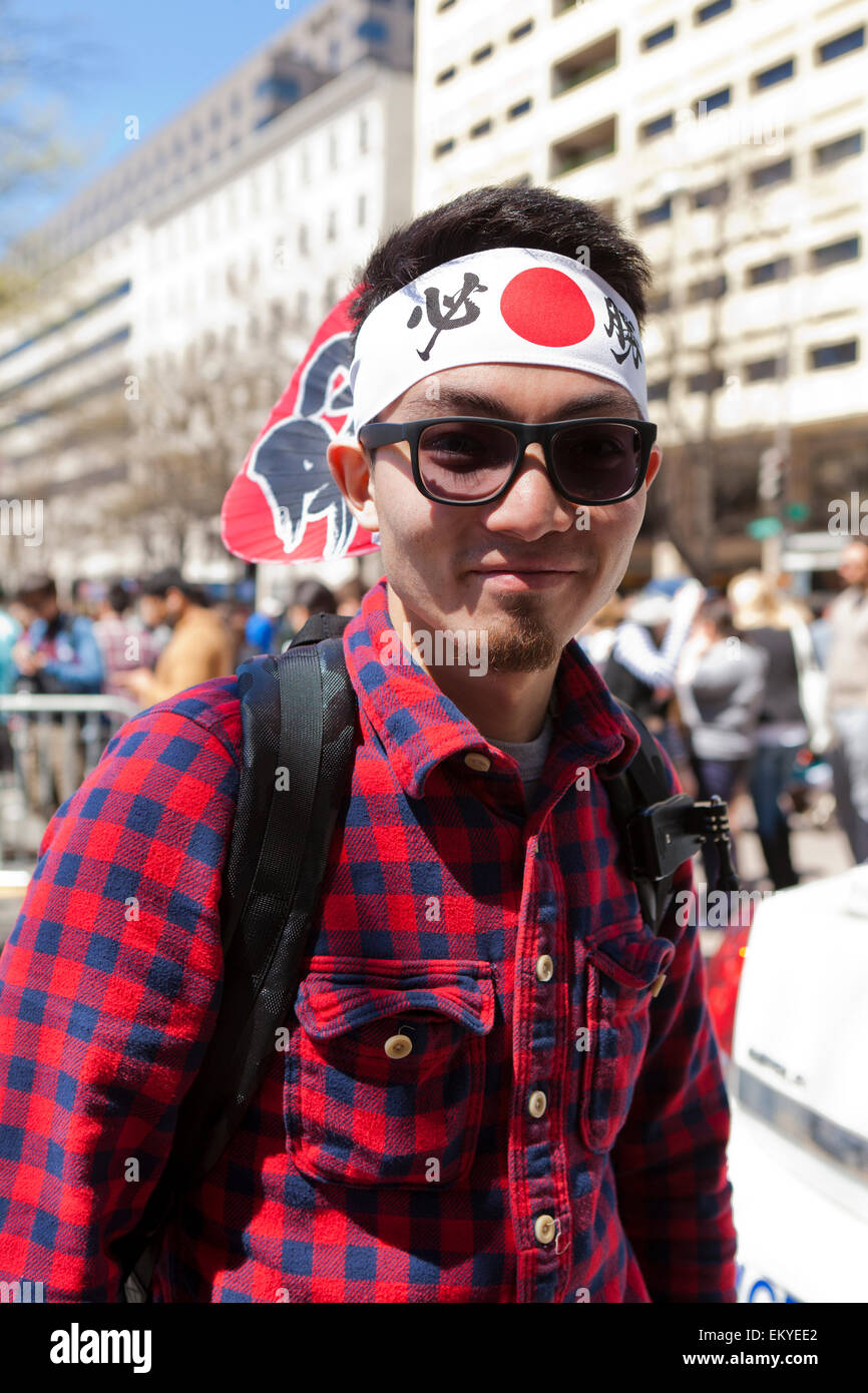 Young Japanese man at Sakura Matsuri (Cherry Blossom Festival) - Washington, DC USA Stock Photo