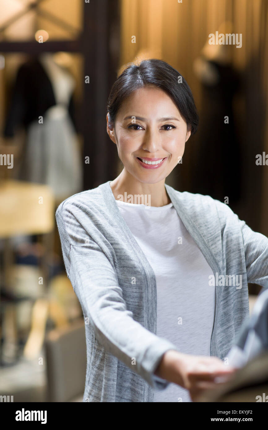 Clothing store owner Stock Photo Alamy