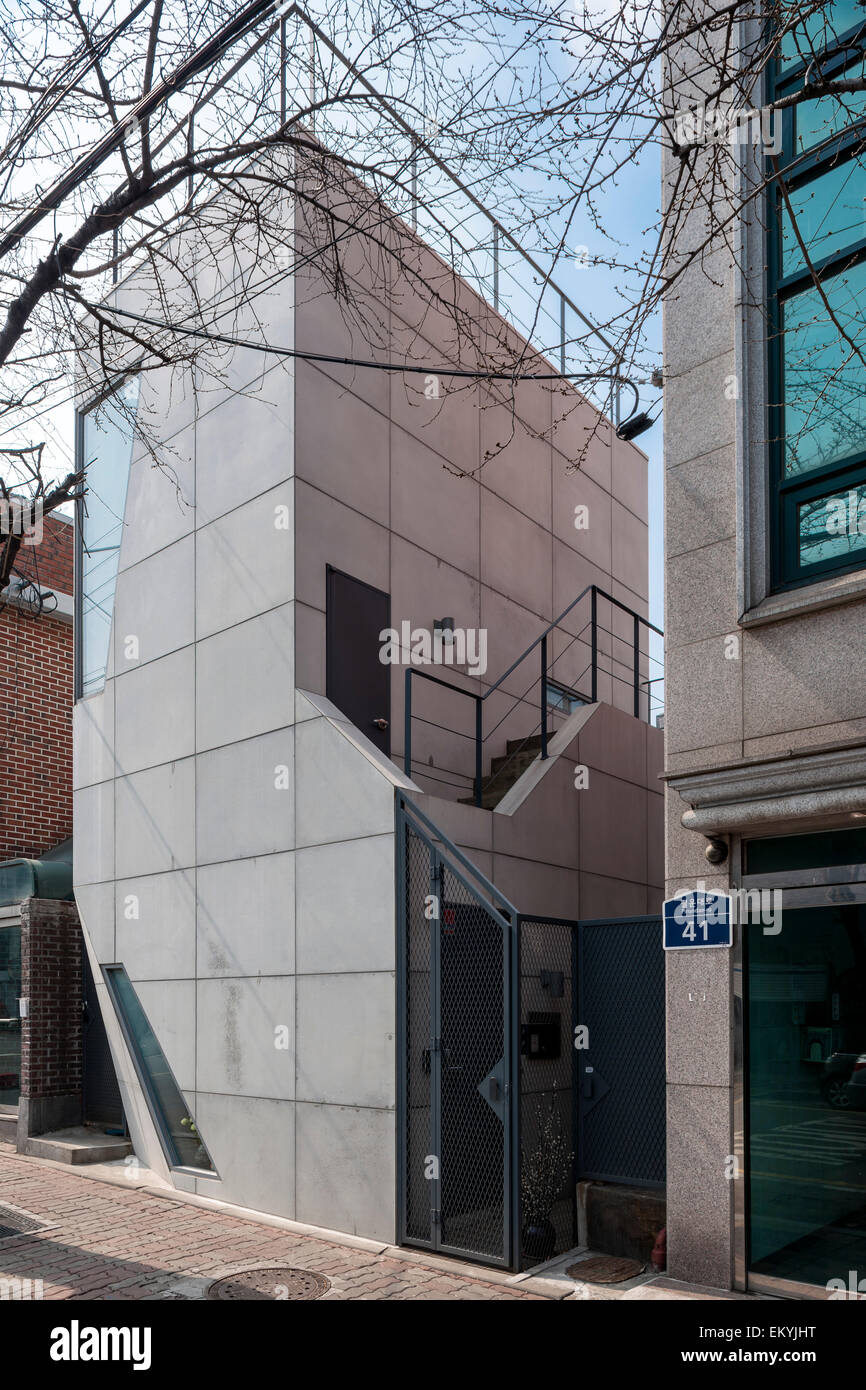 Corner elevation of exterior facade. Mongdang House (Extreme Small House), Seoul, Korea, South. Architect: AnL Studio, 2012. Stock Photo