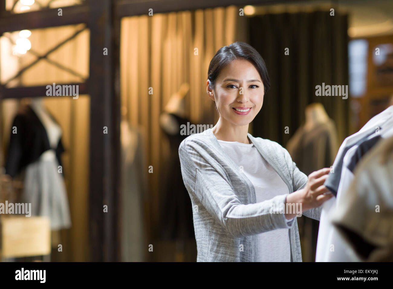 Clothing store owner Stock Photo Alamy