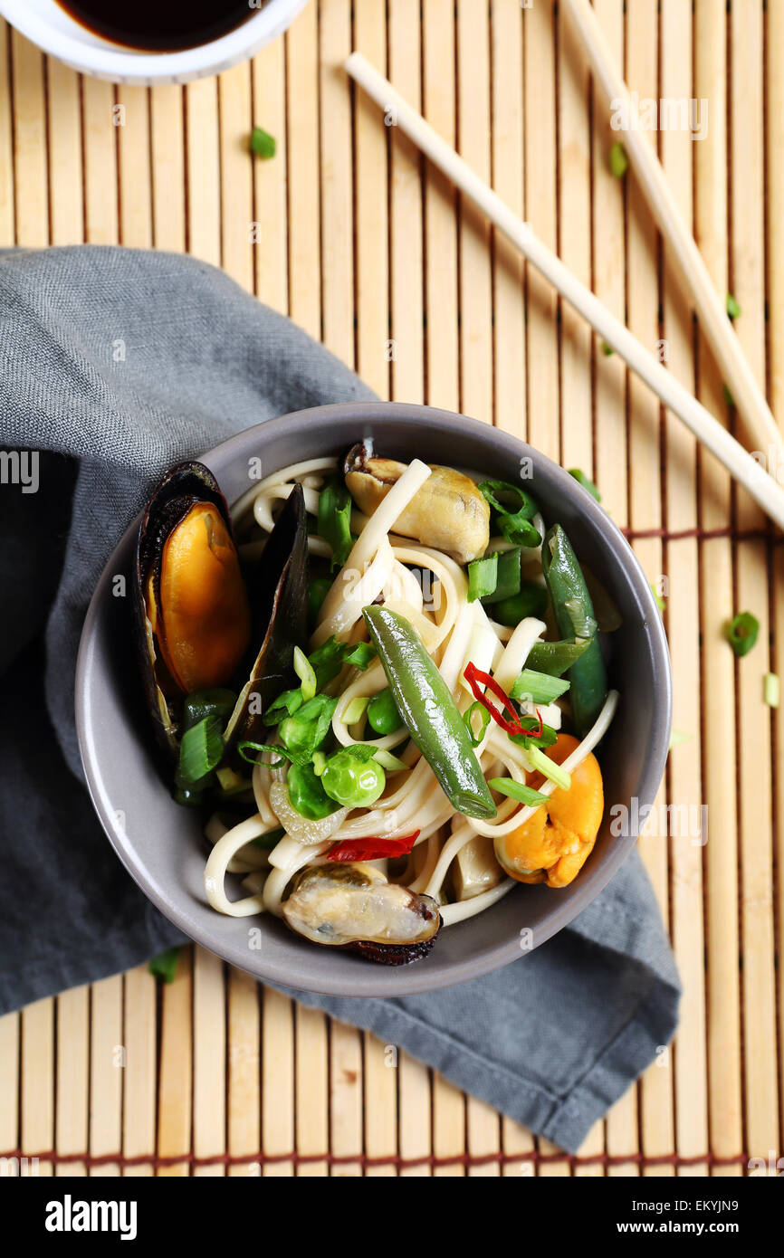 Chinese noodles with mussels in a bowl, food Stock Photo Alamy