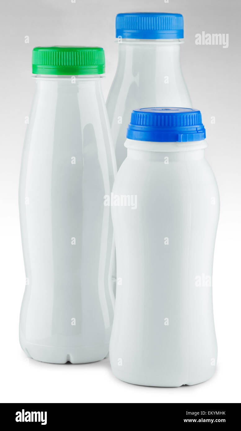 three white bottle on a white background Stock Photo - Alamy