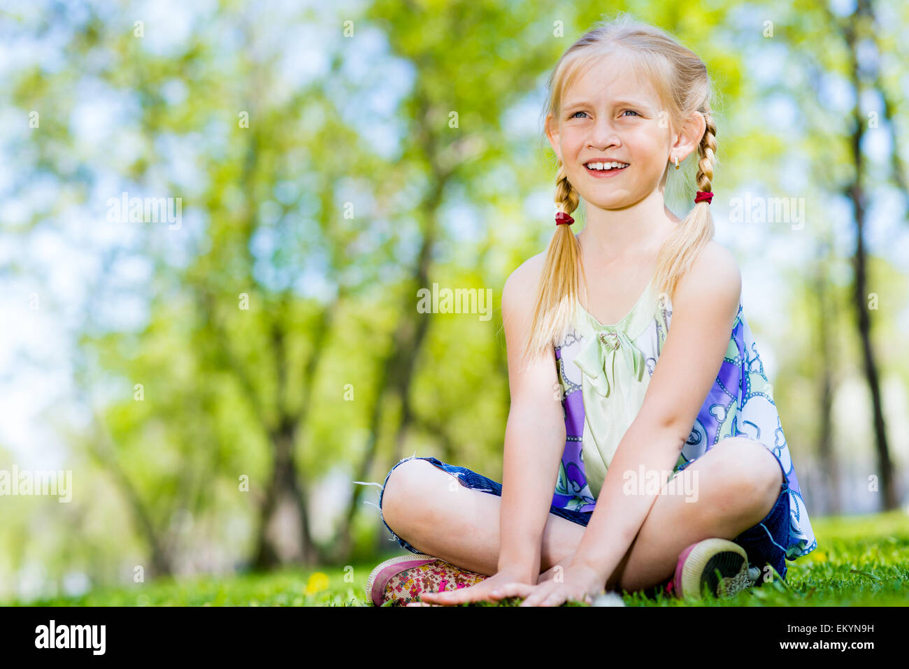 portrait of a girl in a park Stock Photo - Alamy
