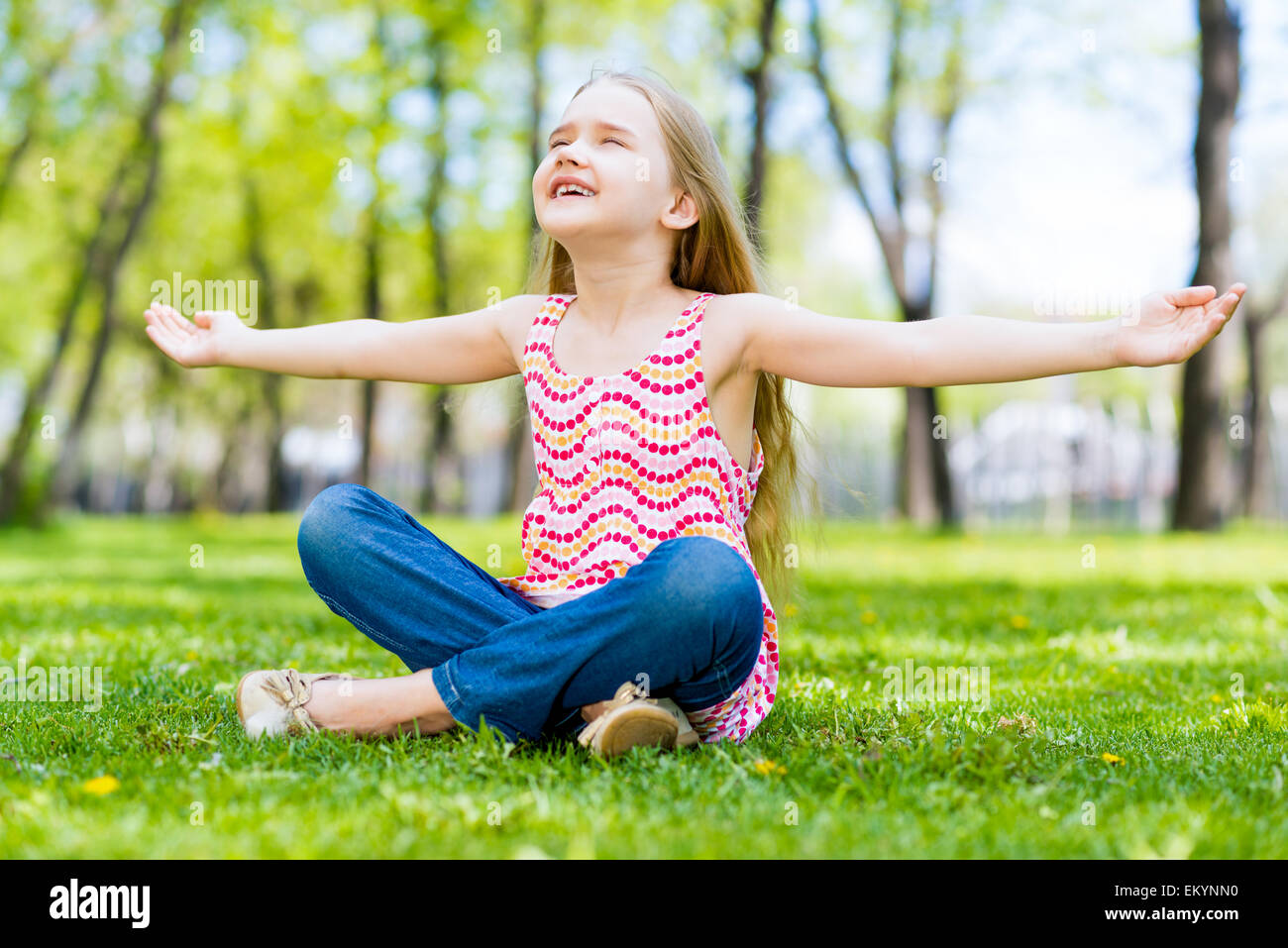 portrait-of-a-girl-in-a-park-stock-photo-alamy