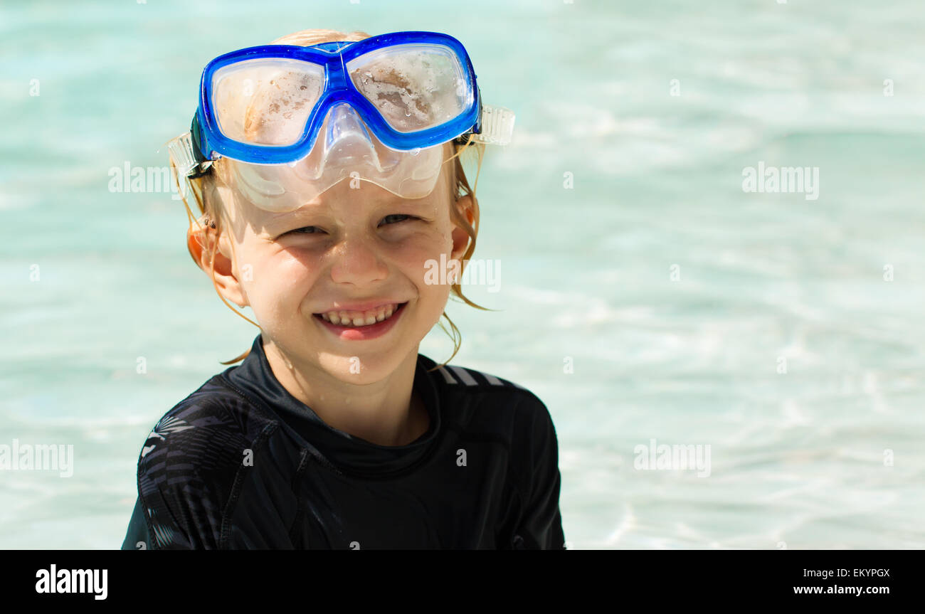 Cute young boy wearing mask Stock Photo Alamy