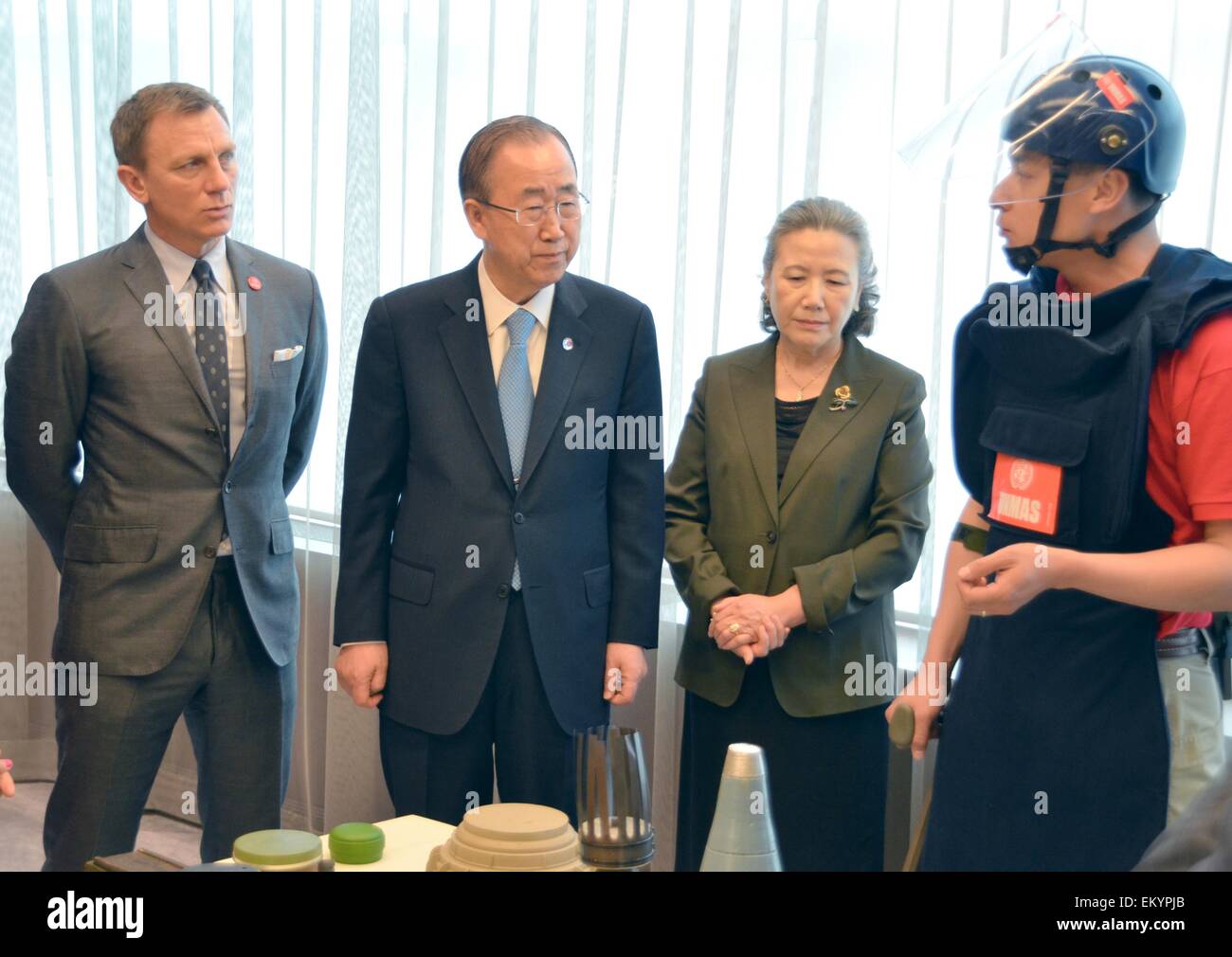 New York, New York, USA. 14th Apr, 2015. British actor Daniel Craig (L) listens next to United Nations Secretary General Ban Ki-moon and his wife Yoo Soon-taek during a meeting at United Nations headquarters in New York, New York, USA, 14 April 2015. Craig was designated as the UN Global Advocate for the Elimination of Mines and Explosive Hazards. Foto: Chris Melzer/dpa - NO WIRE SERVICE - Credit:  dpa/Alamy Live News Stock Photo