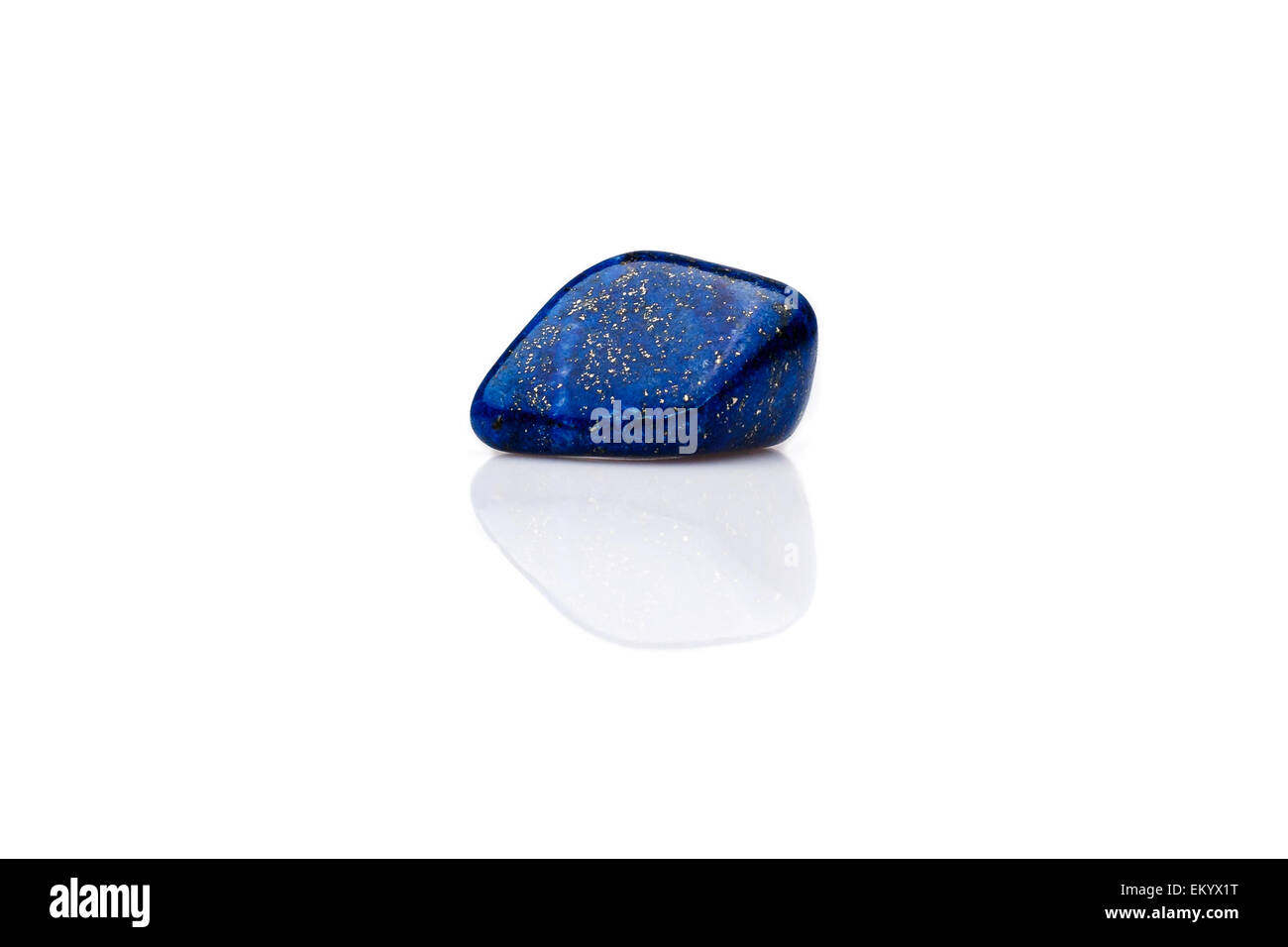 Beautiful blue lapis lazuli gem stone isolated on white background. Found in Afghanistan, deep blue color. Stock Photo
