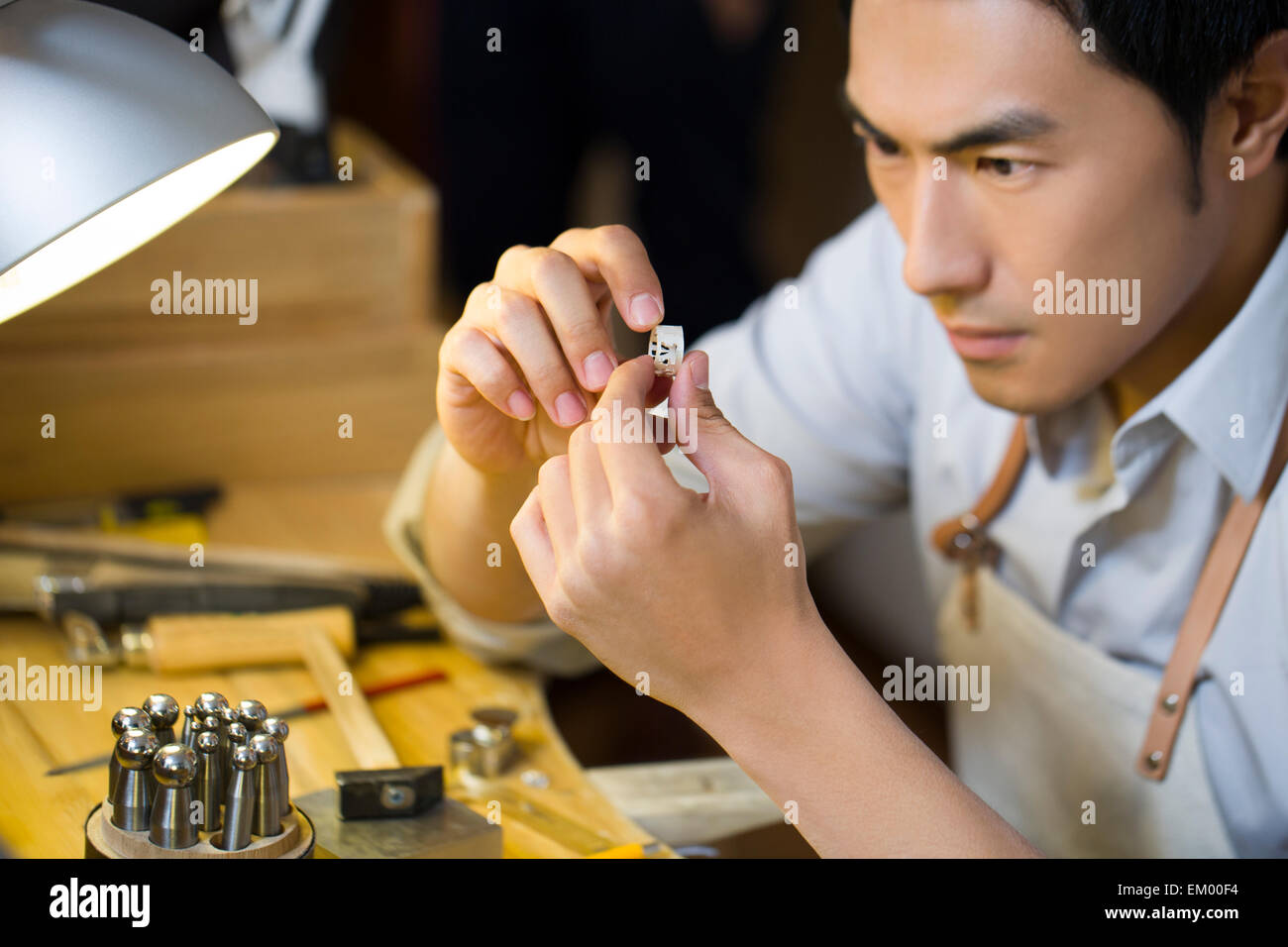 Male jeweler making a ring Stock Photo Alamy