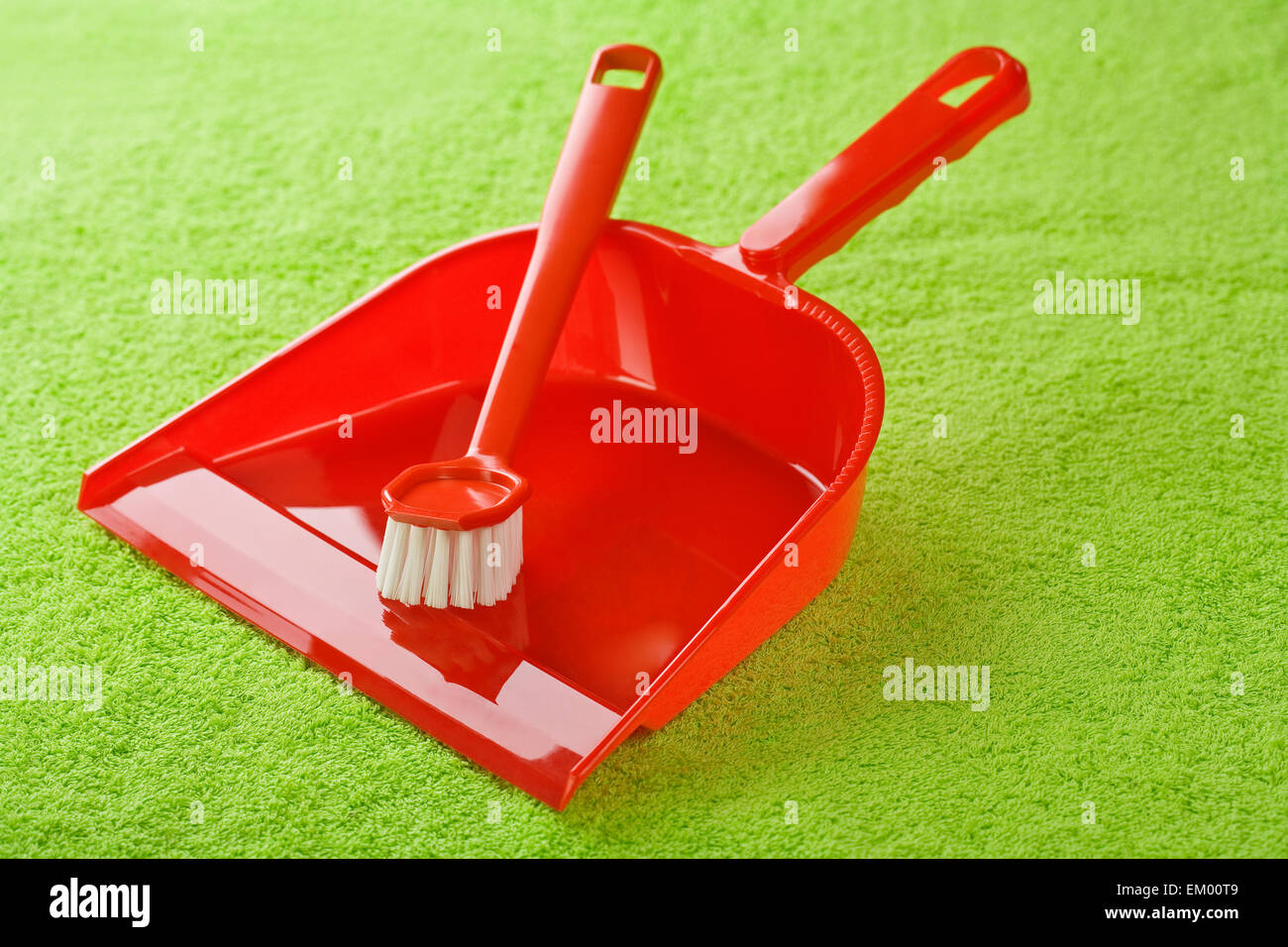 red dustpan with brush Stock Photo Alamy