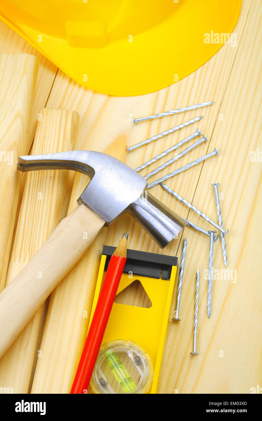 hammer nails level pencil plank harhat Stock Photo Alamy