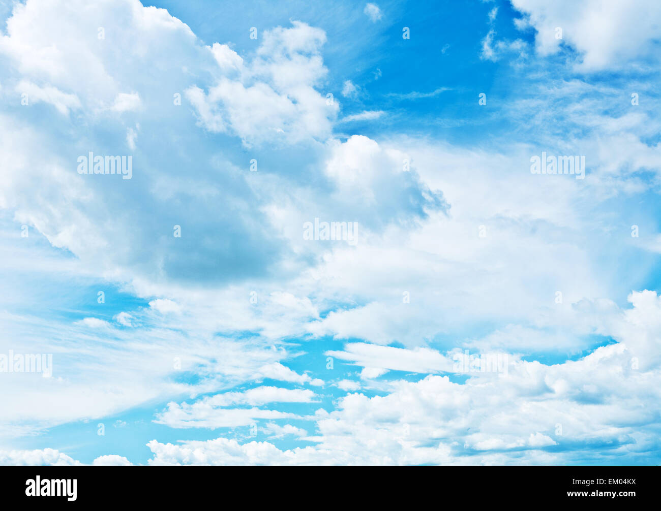 blue heaven vith sparse cumulus clouds Stock Photo