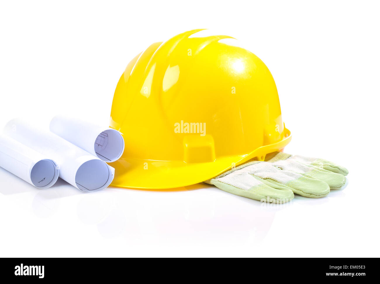 isolated yellow helmet on glove with blueprints Stock Photo - Alamy