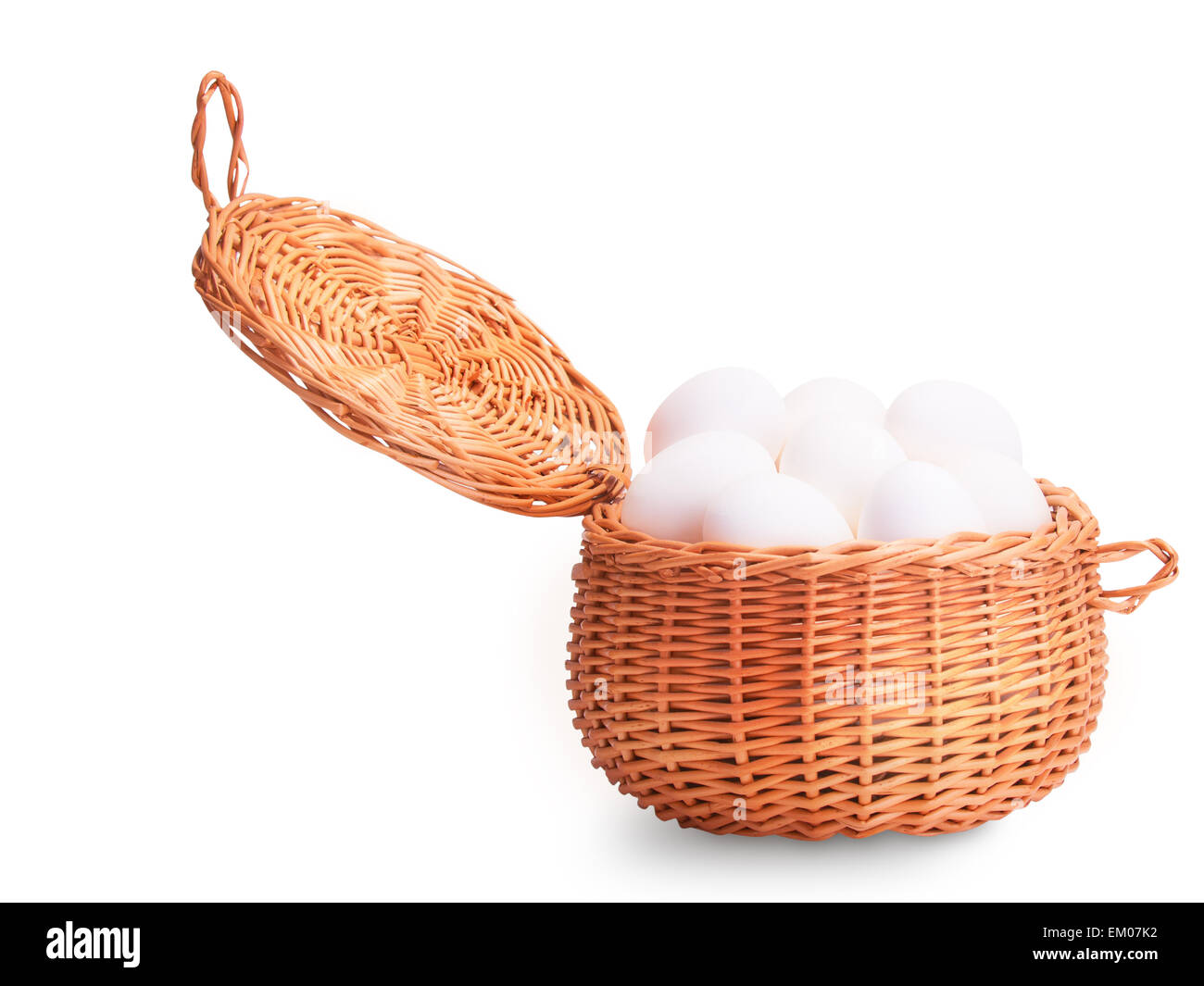 White eggs in basket isolated on white background Stock Photo - Alamy