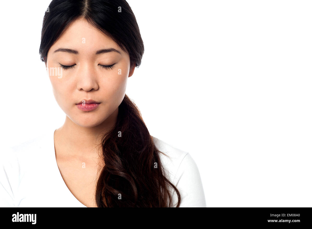 Young girl with closed eyes at peace Stock Photo - Alamy