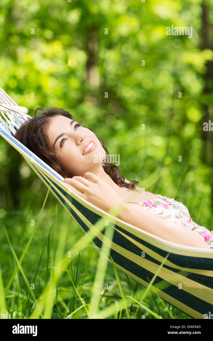 Young woman lying in a hammock Stock Photo - Alamy
