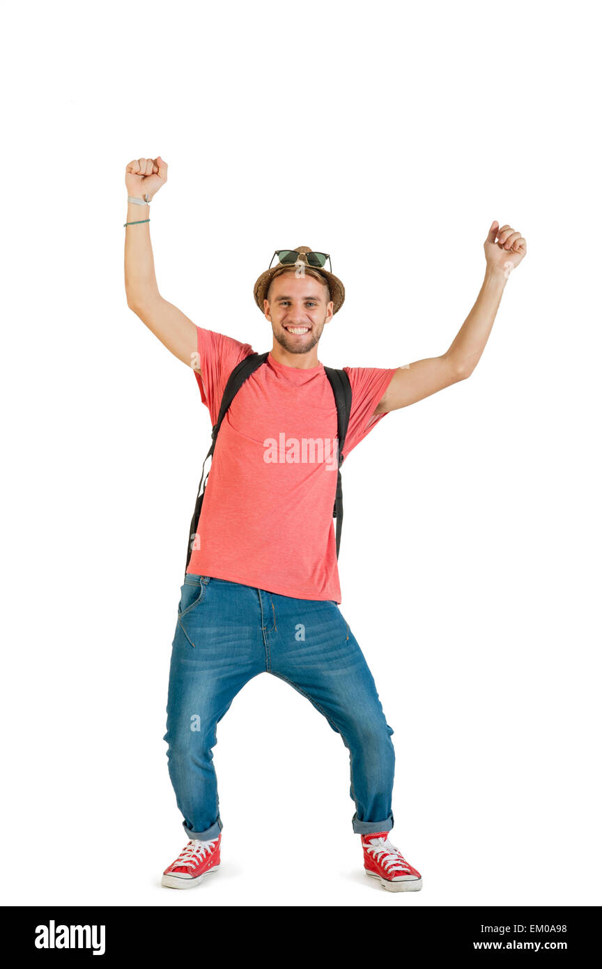 Young happy tourist traveling with camera and pack Stock Photo