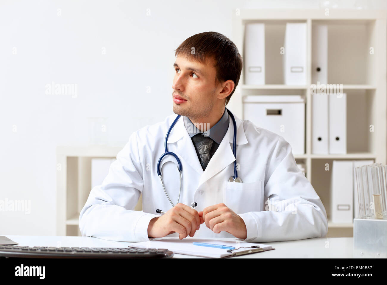 Doctor in white uniform blue hi-res stock photography and images - Alamy