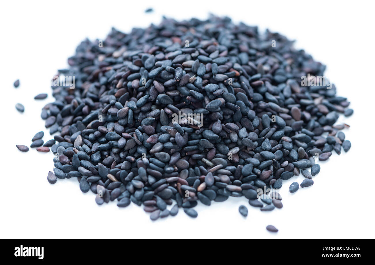 Portion of black Sesame isolated on white background Stock Photo - Alamy
