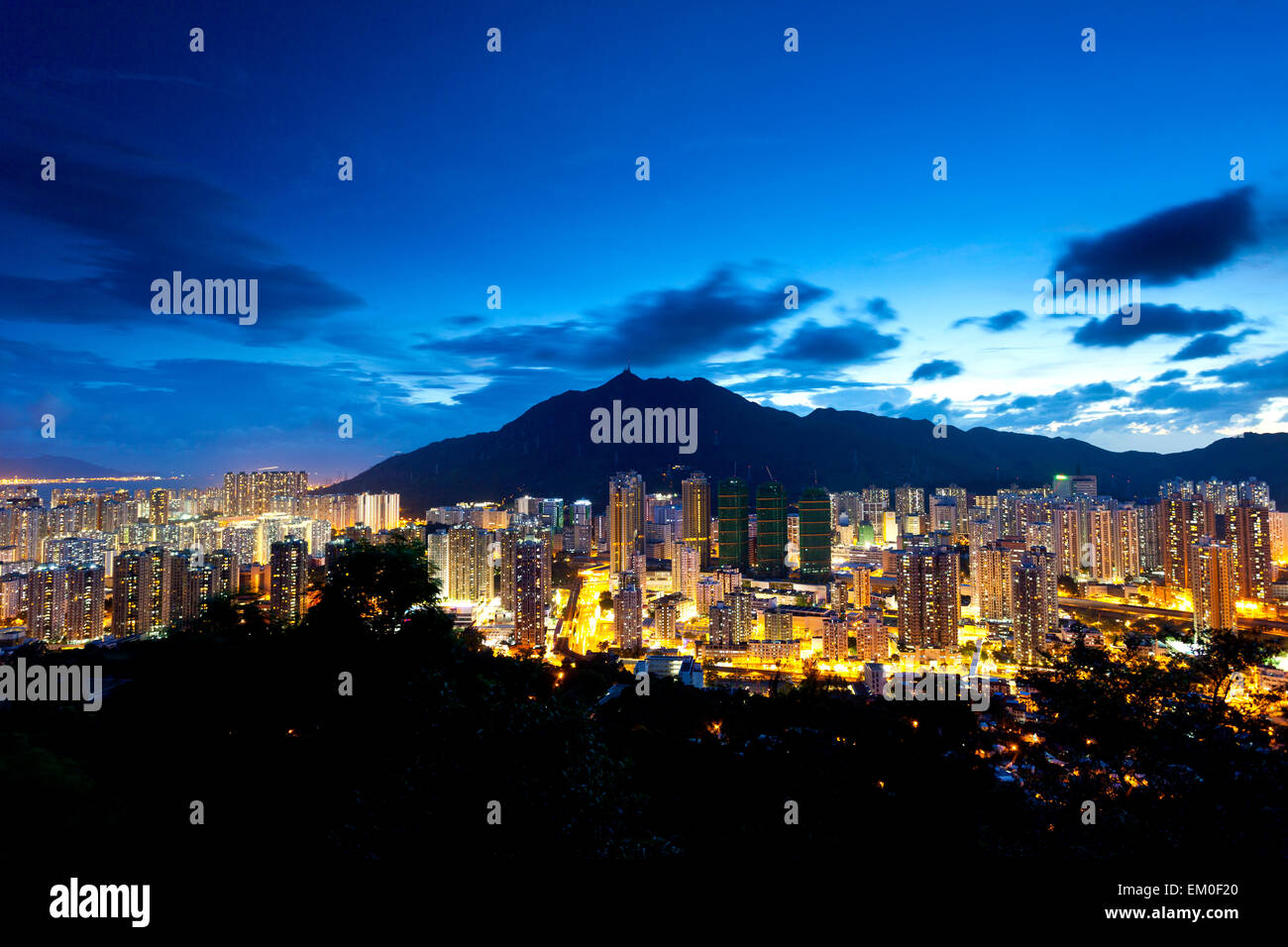 Hong Kong apartment blocks at night Stock Photo - Alamy