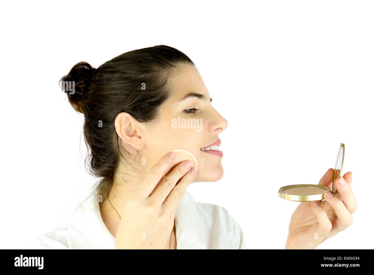 Powdering her face Stock Photo