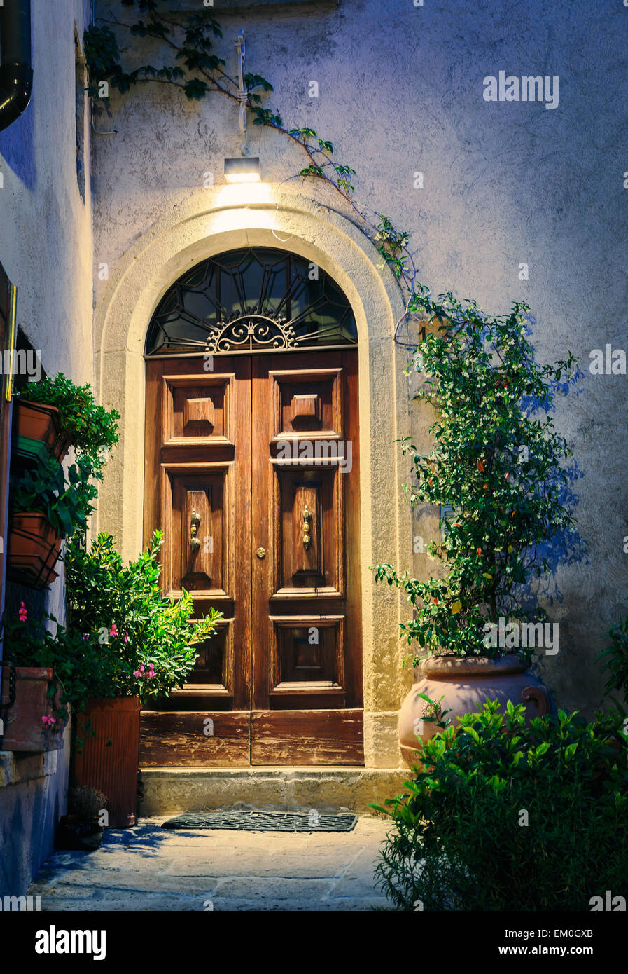 Entrance to the old Italian house at night Stock Photo Alamy