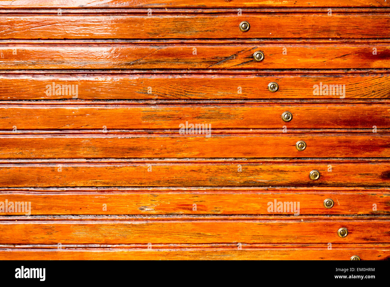 wooden slats of an old circus caravan, glossy laquered wood panels ...