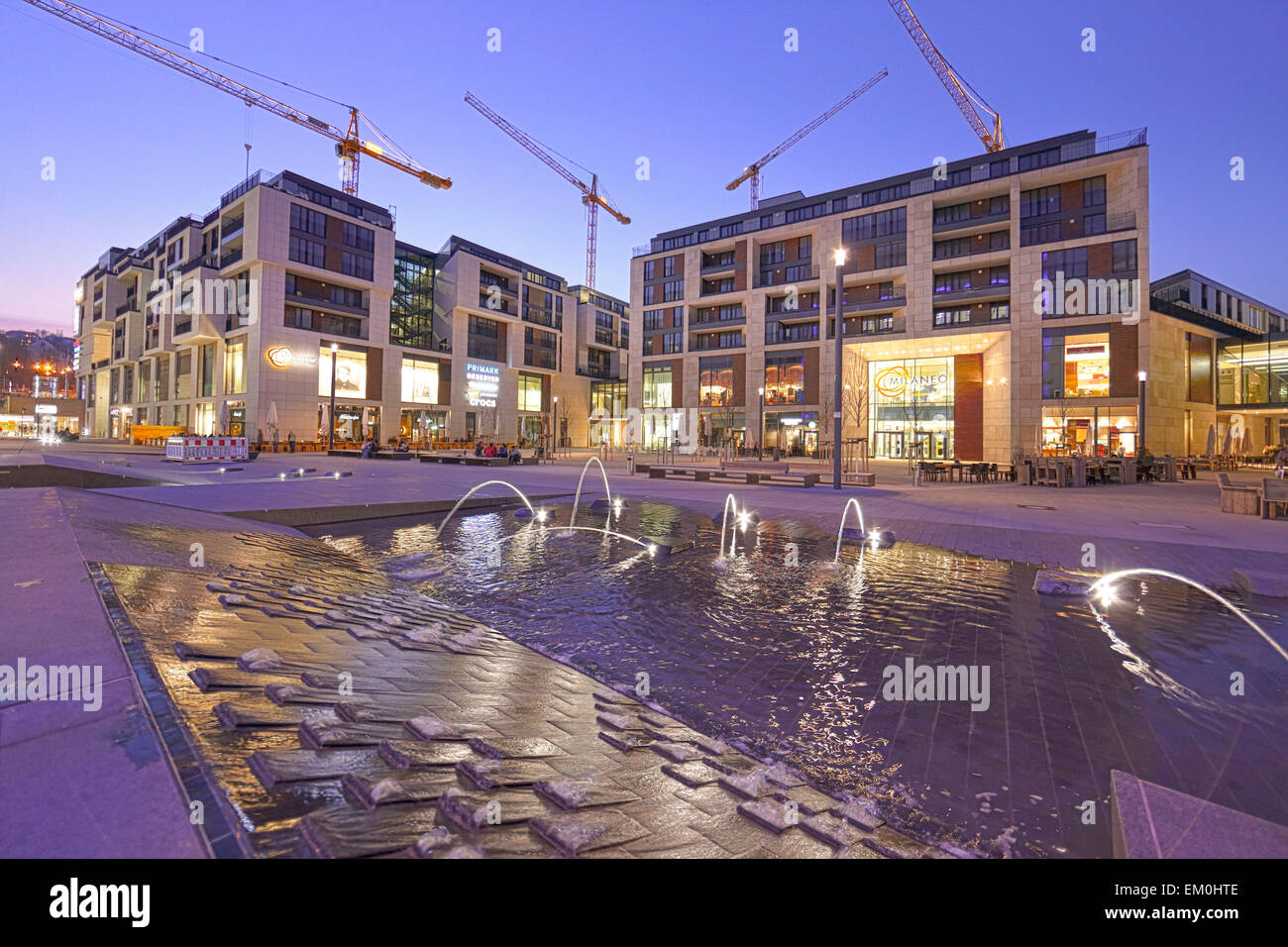 Germany, Stuttgart, night-shot Milaneo shopping-mall under construction, fountain, outside section, buildings and entrance Stock Photo