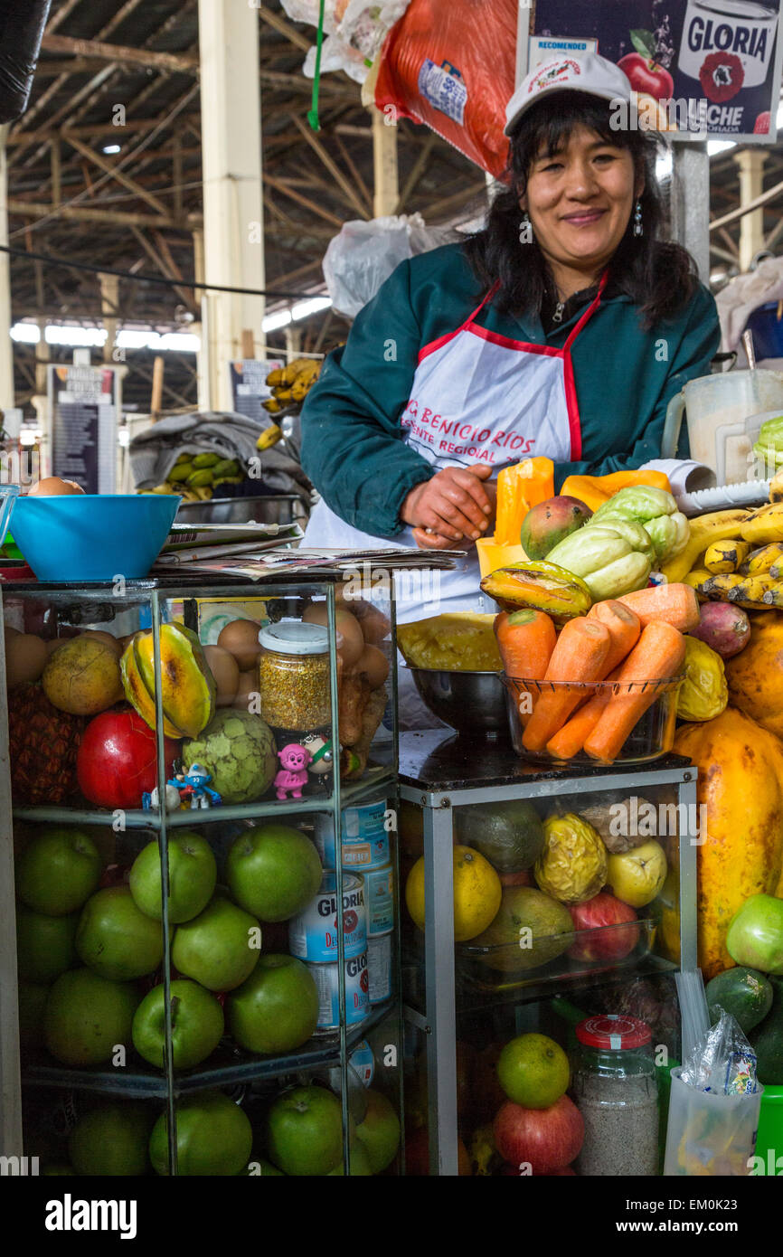 Peru, Cusco.  Juice Vendor, San Pedro Central Market. Stock Photo