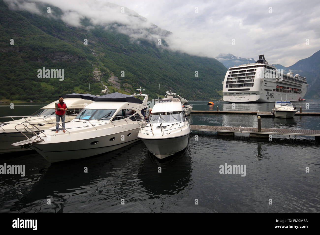 Quayside of the Geirangerfjorden, with cruise ship MSC Opera tendered, Geiranger, Norway, Scandinavia, Europe Stock Photo