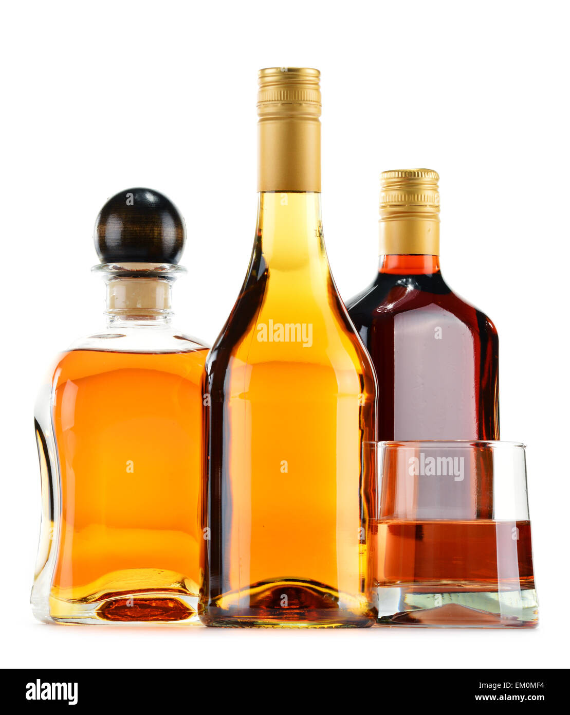 Bottles and glasses of alcoholic beverages isolated on white background Stock Photo